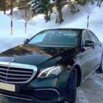 Hire with driver Mercedes E Class where pictured is in the mountains with snow imparted